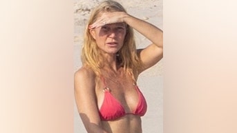 Gwyneth Paltrow enjoys beach VACATION